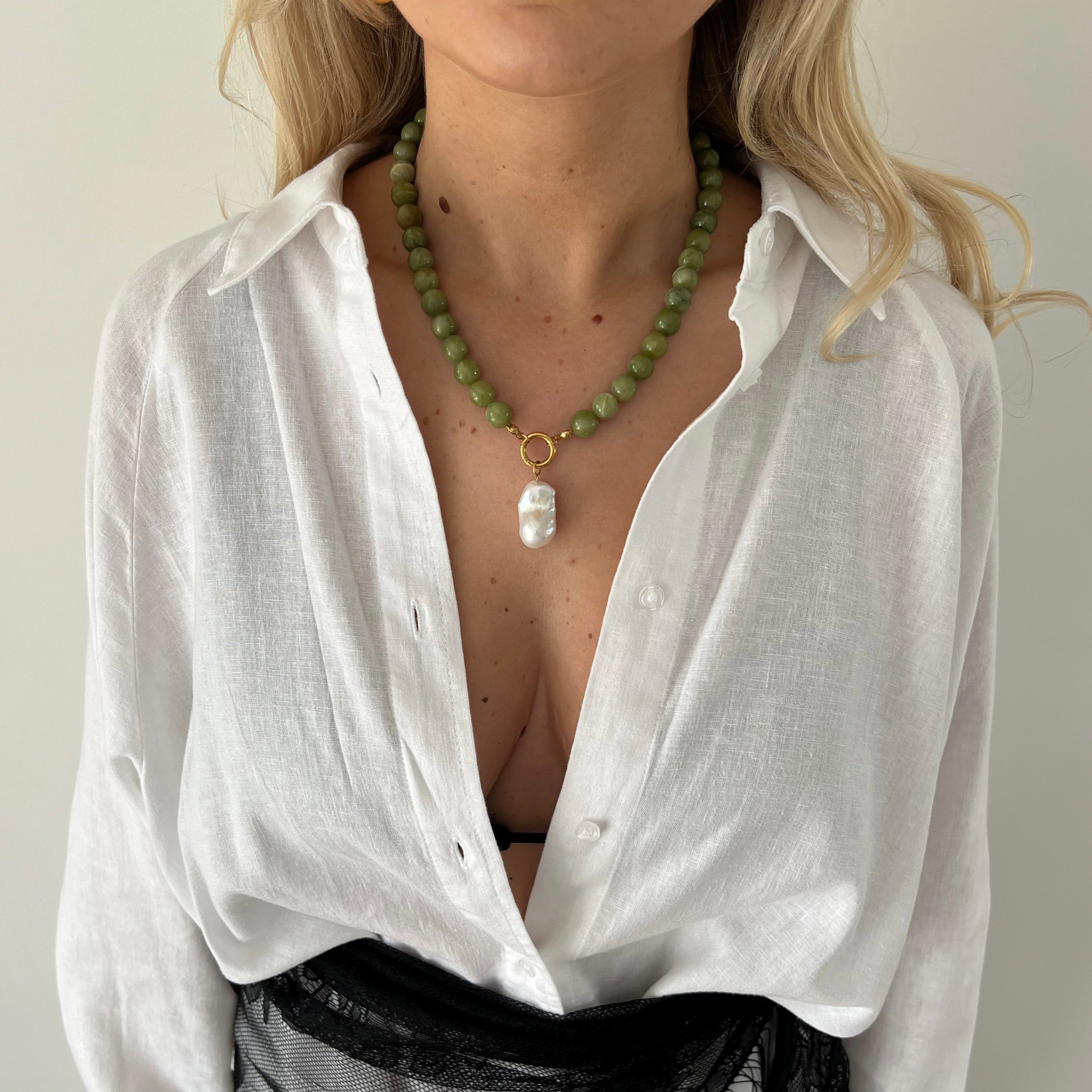 Green jade beaded necklace with gold clasp styled with pearl charm
