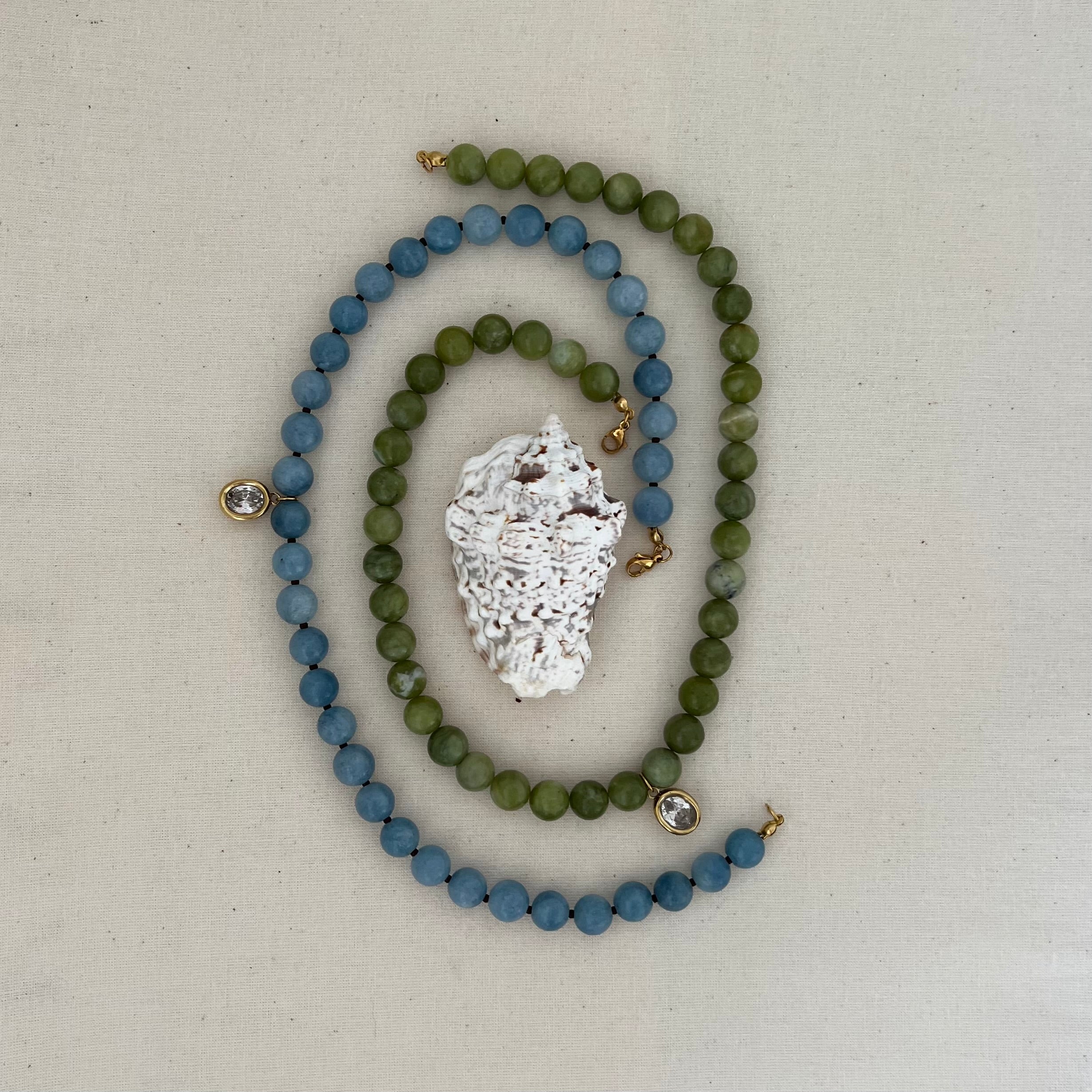 Blue Angelite beaded oval pendant and green jade beaded oval pendant necklaces